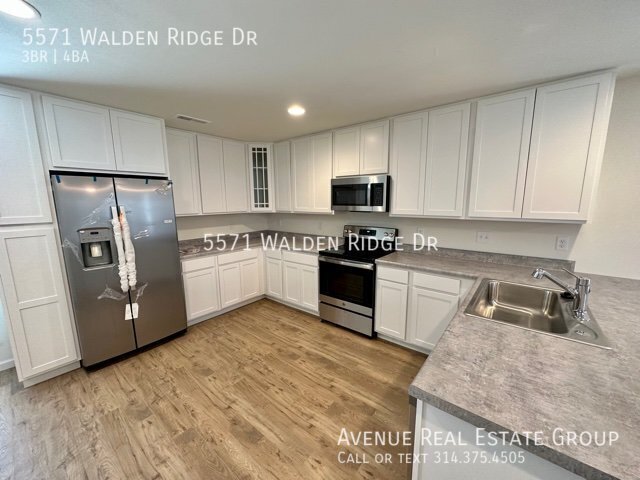 Building Photo - Modern 3-Bed Townhome at Walden Ridge – Do...