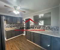 Building Photo - Step into comfort and convenience with this spacious 3-bedroom, 1-bathroom single-family home des...