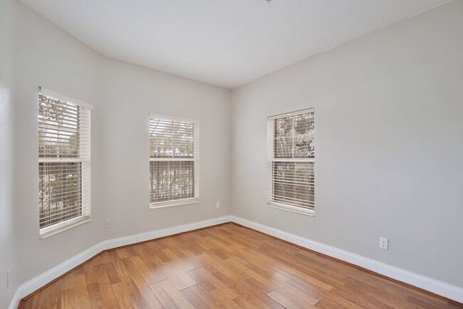 Building Photo - AGENT SHOWINGS ONLY! Stunning 3/2.5 Corner Unit Townhome with a Spacious 2 Car Garage in the Gate...