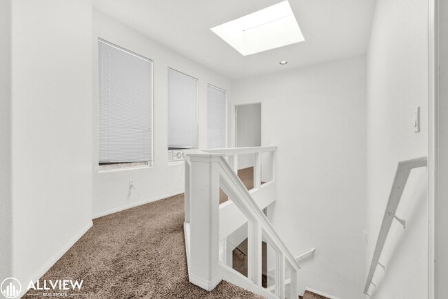 Building Photo - Spacious Coastal Condo with Rooftop Ocean ...