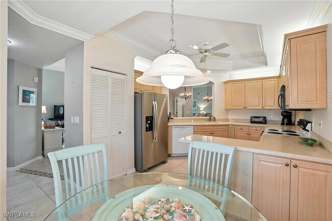 Building Photo - 7032 Pelican Bay Blvd