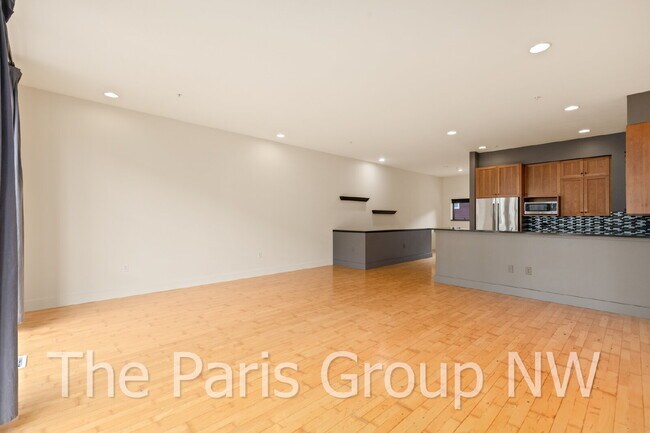 Building Photo - Exceptional 2 Story CapHill Condo * 2 Pkg Spaces, EV Charger & Rooftop Views