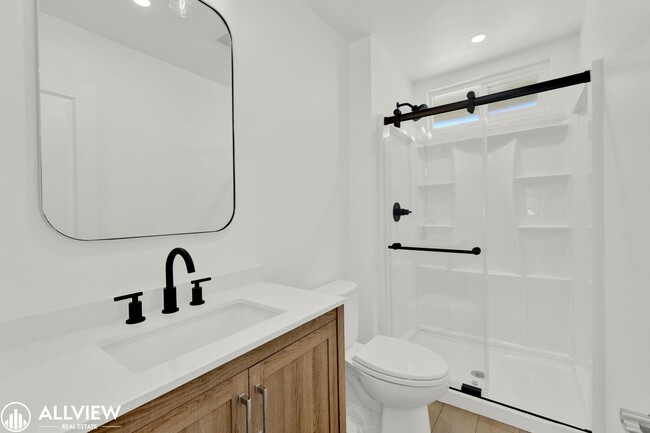 Building Photo - Fully Renovated 4-Bedroom Home with Firepl...