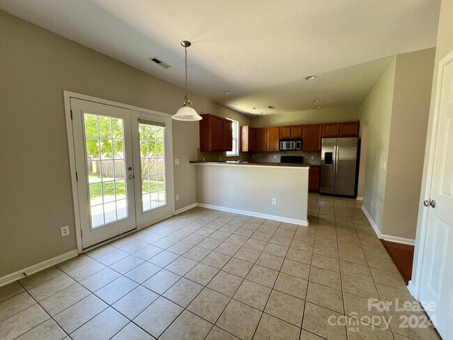 Building Photo - 10311 Dominion Village Dr