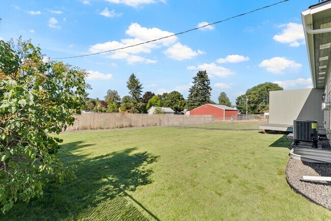Building Photo - Newly built 4 Bedroom Duplex With Garage