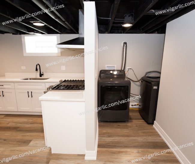 Building Photo - SPECIAL OPPORTUNITY – LARGE 6 BEDROOM RELATED-LIVING HOME