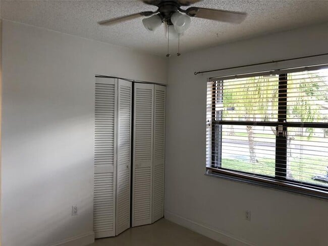 Building Photo - 9800 NW 16th Ct