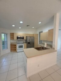 Building Photo - 100 Cocoplum Cir
