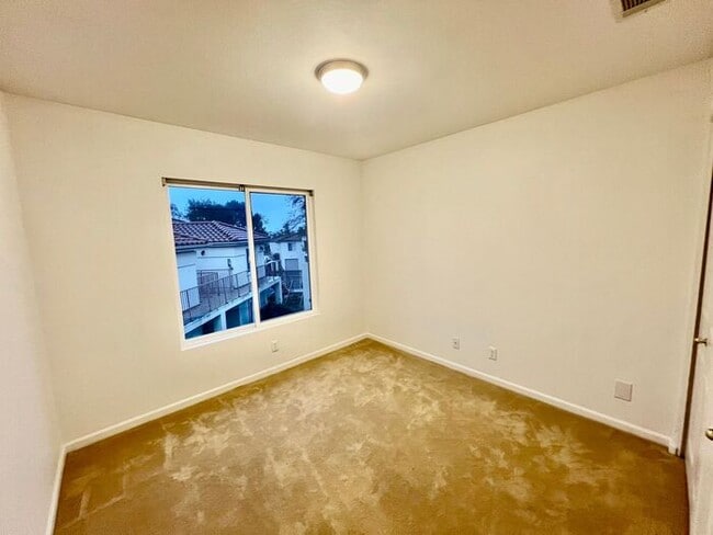 Building Photo - Welcome to this beautiful 3-bedroom, 2-bathroom condo in the desirable Avalon at Eagles Crossing