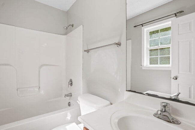 Building Photo - "Charming 3-Bedroom Sanctuary with 2 Full ...