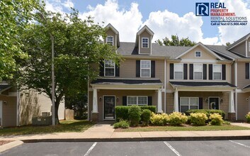Building Photo - Beautiful 2BR/2.5 BA M'boro end unit townhome!