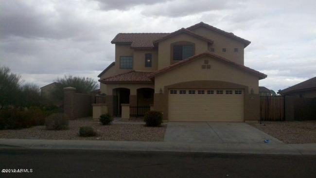 Building Photo - "Spacious 4-Bed, 3-Bath Oasis in Buckeye w...