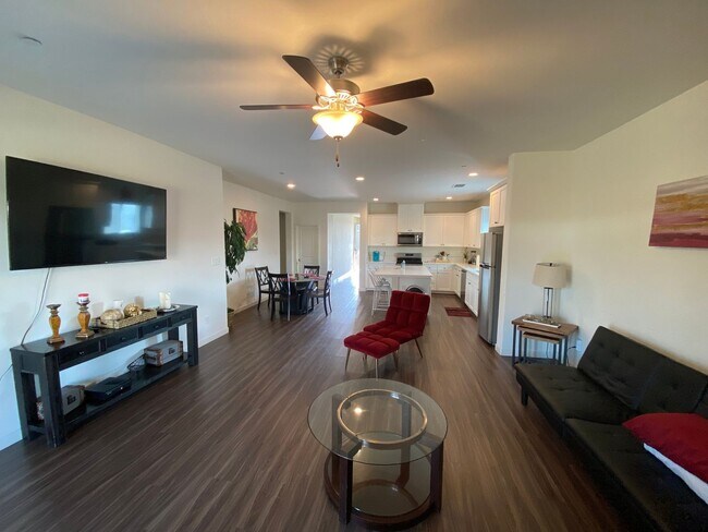 Building Photo - Welcome to the Best Deal in Town. Fully furnished 4 BD 2 BA house on a corner lot