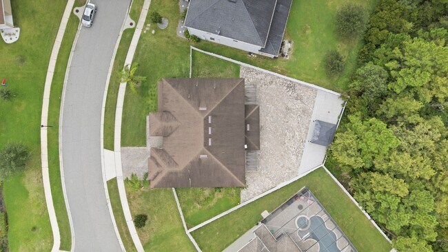 Building Photo - Spacious 6-Bedroom Home Near Lake Nona | 3-Car Garage + Tesla Charger