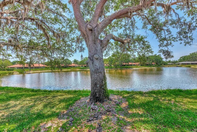 Building Photo - BEAUTIFUL 2 BEDROOM 2 BATHROOM + A DEN VILLA WITH GORGEOUS LAKE VIEWS!