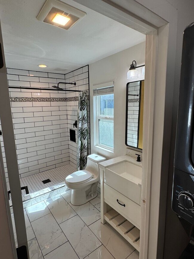 Building Photo - !! MOVE-IN SPECIAL !! Cozy Carson Back House with Skylights & Washer/Dryer