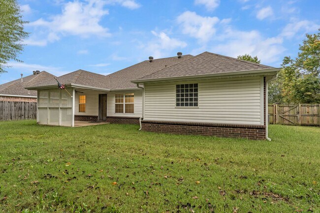Building Photo - Charming 3-Bedroom Home with Fireplace & A...