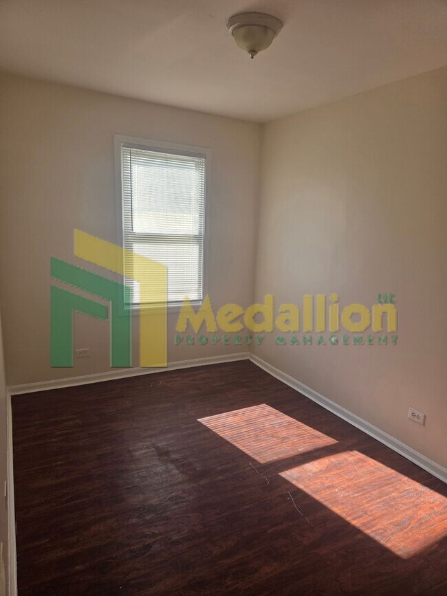 Building Photo - 8725 S Constance Ave