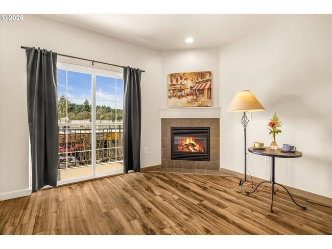 Building Photo - Main Street Living with Granite Kitchen, Gas Fireplace, and MAX Line Access