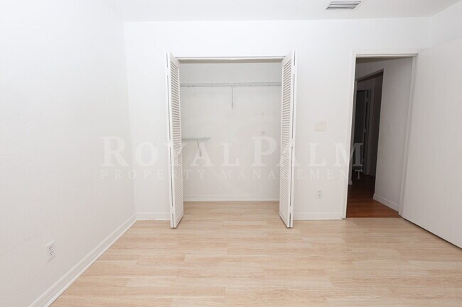Building Photo - 2 Bed, 2.5 Bath Townhouse with Balcony, Pool & Prime Bonita Springs Location