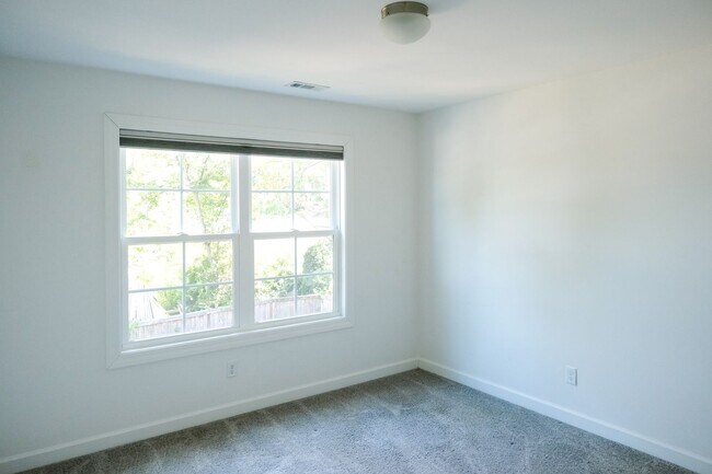 Building Photo - Like-new 3 bedroom, 2.5 bath house with an organic pond!