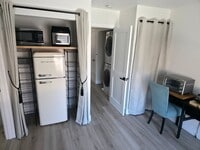Building Photo - Furnished Bedroom rental with Bonus Kitchenette and office room