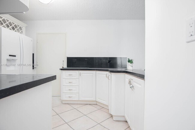 Building Photo - 5555 Collins Ave