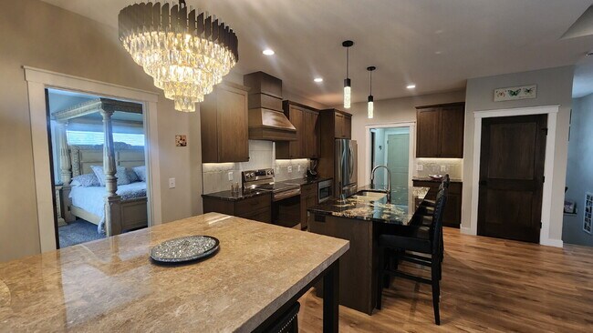 Building Photo - 5 Bedroom, 3 Full Bathroom House with 3 Ca...