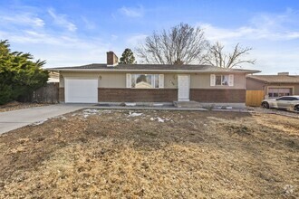 Building Photo - Charming 4-Bedroom, 2-Bath Raised Ranch in...