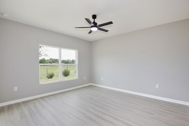 Building Photo - Move-In Ready 2BR/2BA Villa with Den + 2-Car Garage | Lake Nona Adjacent | Suncrest at St. Cloud
