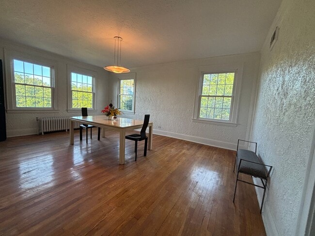 Building Photo - Vintage Beauty, Modern Living – Historic Condo Awaits!