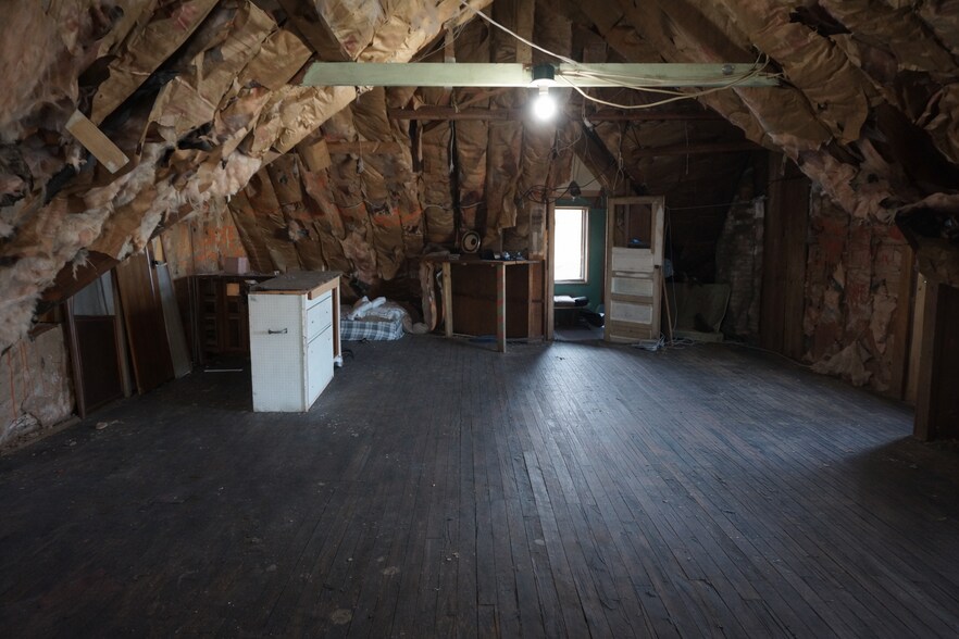 Attic - 3284 N Oakland Ave