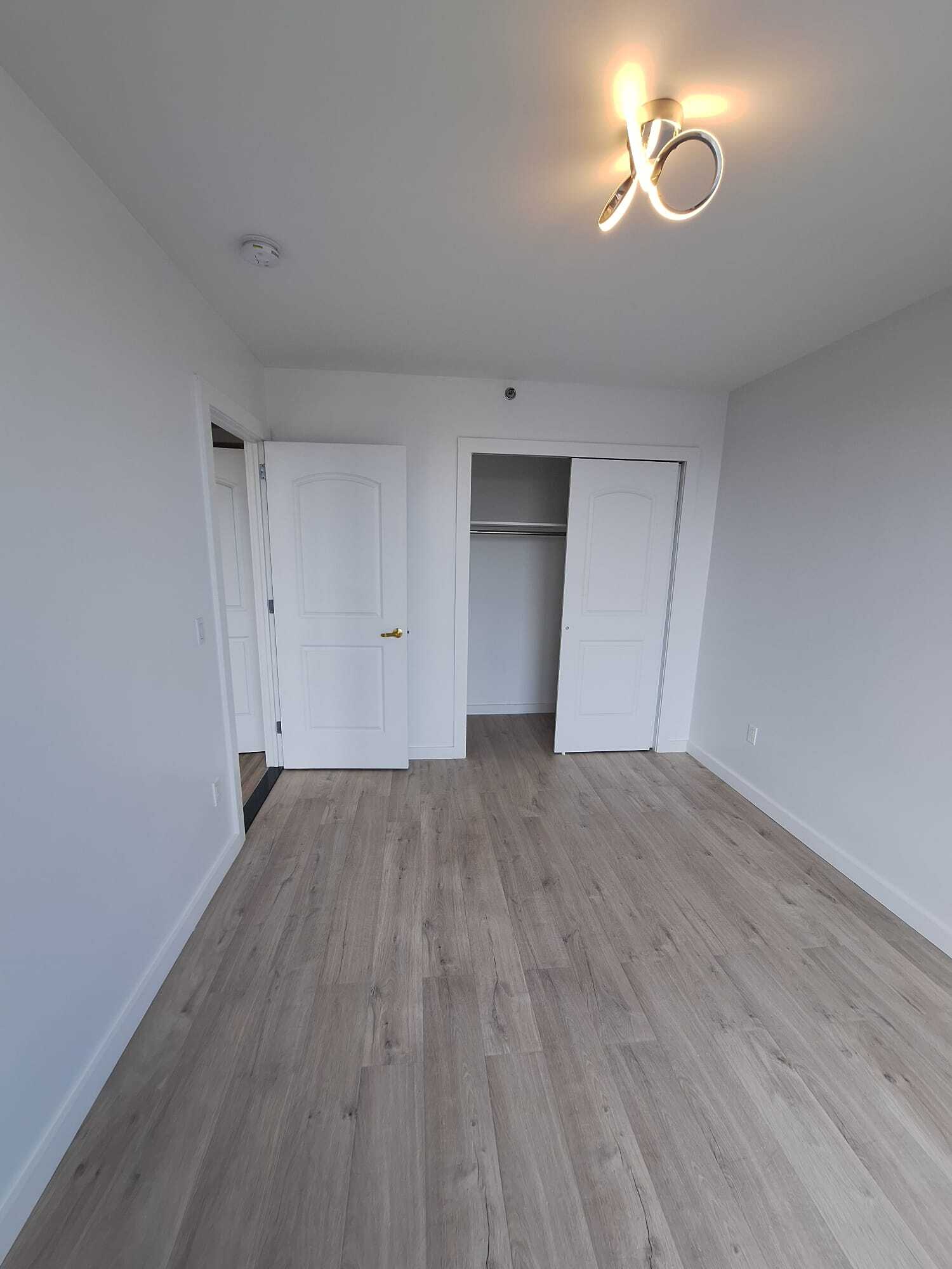 Bedroom with a closet - 7065 Queens Blvd