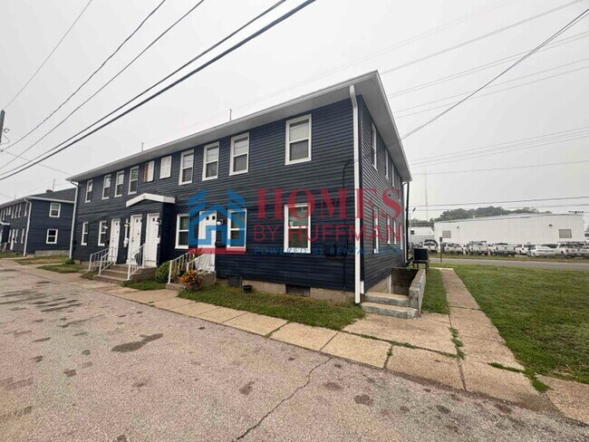 Building Photo - One Bedroom Apartment | Laundry Facility | Utilities Included