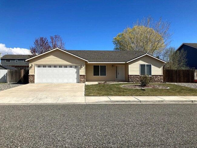 Building Photo - this ranch-style home features 4 bedrooms and 2 bathrooms.