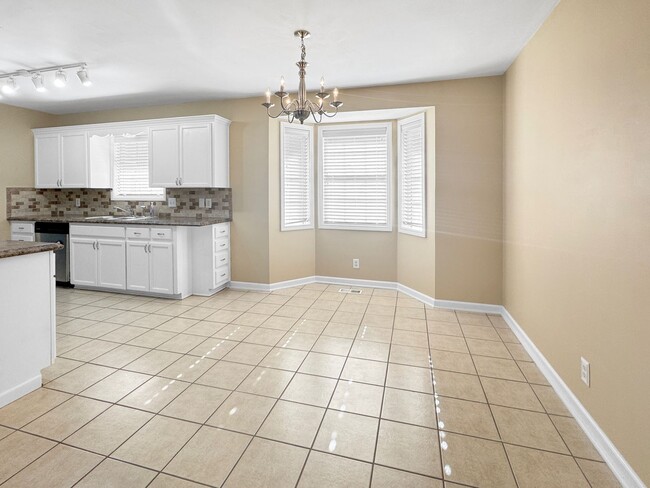 Building Photo - Spacious 3 Bed/3 Bath Midtown Home with Oversized Garage, Large Deck, and Storage Shed