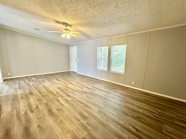 Building Photo - Privacy and Space in this 3/2 Home at the ...