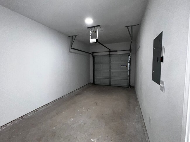 Building Photo - Modern 3BR Townhome w/ Garage, Private Yard & No Carpet – Built 2022