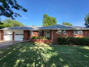 Building Photo - Remodeled 3 bedroom 2 bathroom house with 2 car garage and fenced yard