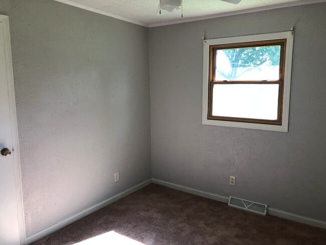 Building Photo - Check Out this Renovated House in a Quiet Neighborhood with a Large Yard!