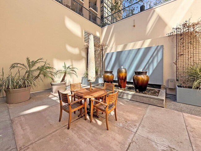 Building Photo - Modern Downtown Condo – 2BR/1BA in the Hea...