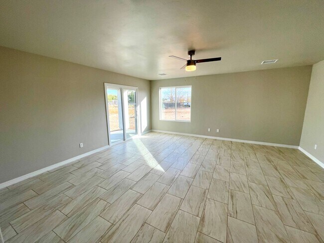 Building Photo - Cute home built in 2023 with garage and la...