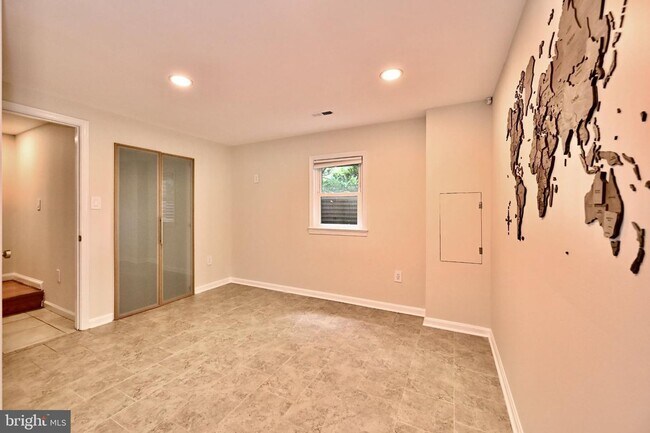 Building Photo - Discover an exquisite opportunity to lease a stunning end-of-row townhouse in the prestigious Bet...