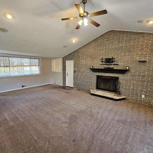 Building Photo - 3 Bedroom, 1.5 Bath Brick Ranch. Huge Great Room and Living Room. Big Kitchen, Backyard with Deck...