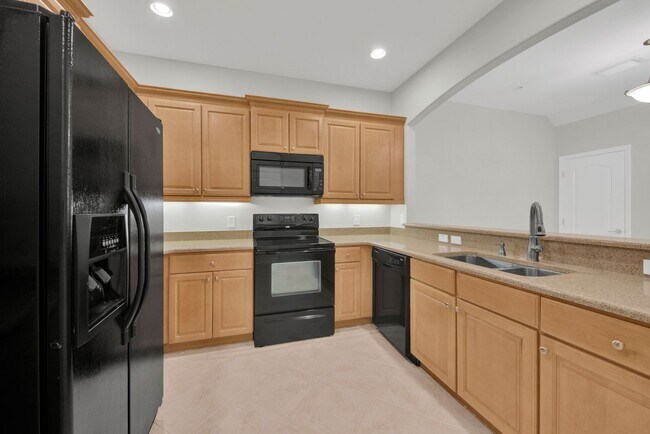 Building Photo - Spacious 3-Bedroom Townhome in the Prestigious Matera Community