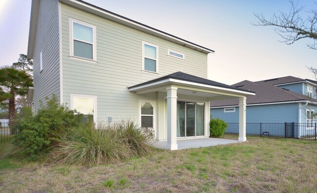 Building Photo - Beautiful Pond-Front Home Near Amelia Concourse