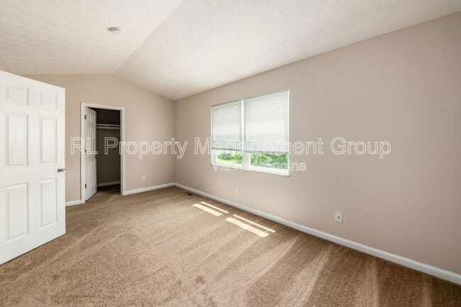 Building Photo - 7179 Feather Ct