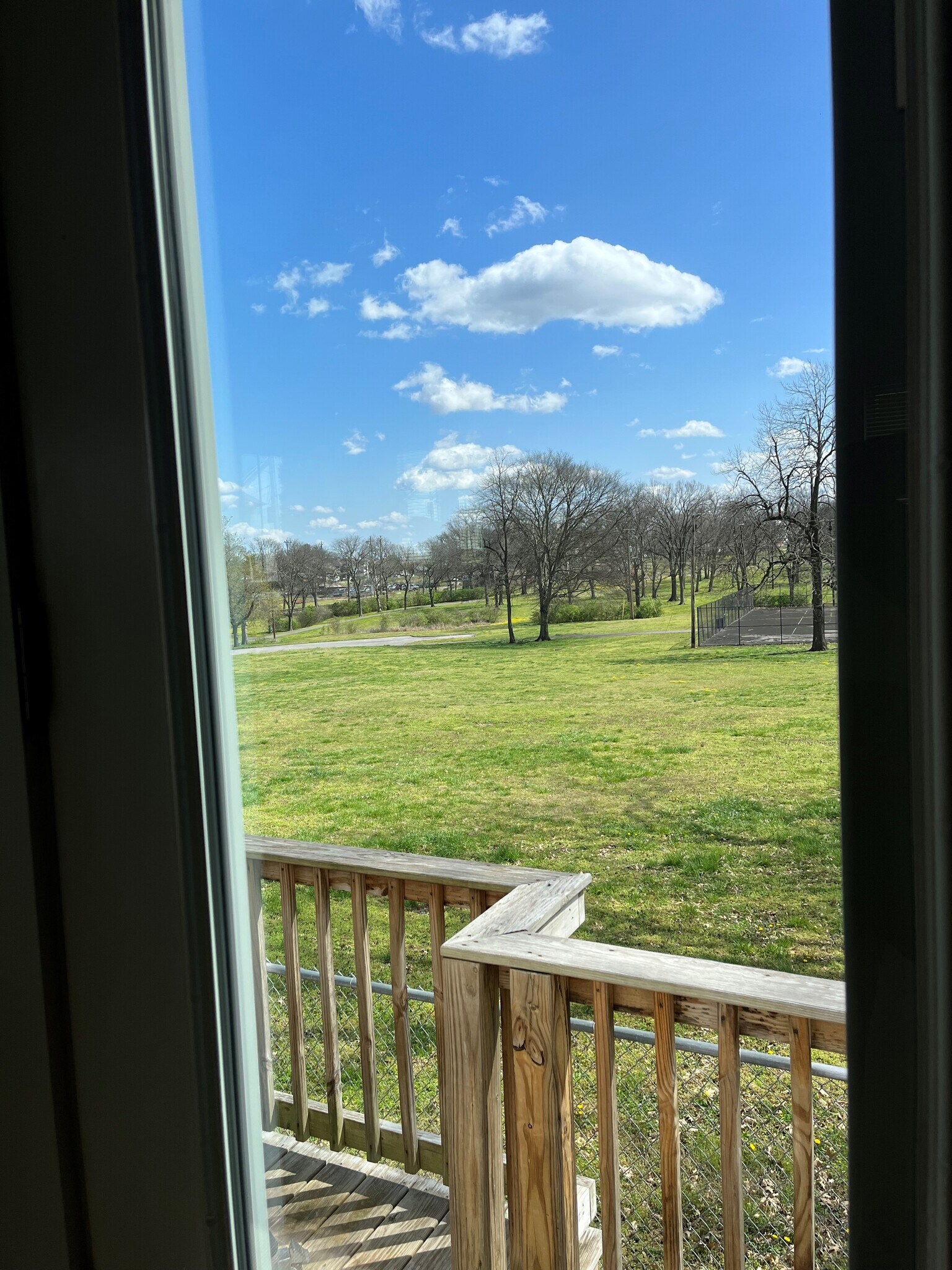 view of deck and park from living room - 6361 A Ivy St