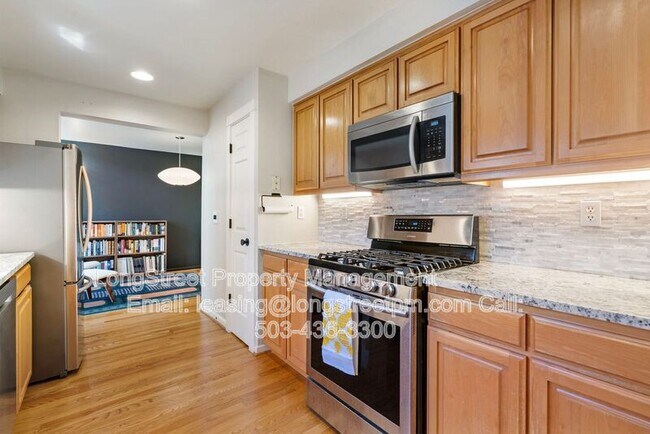 Building Photo - 10247 NW Village Heights Dr