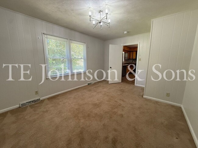 Building Photo - 3BR Home with Stainless Steel Appliances, Hardwood Floors & Carport